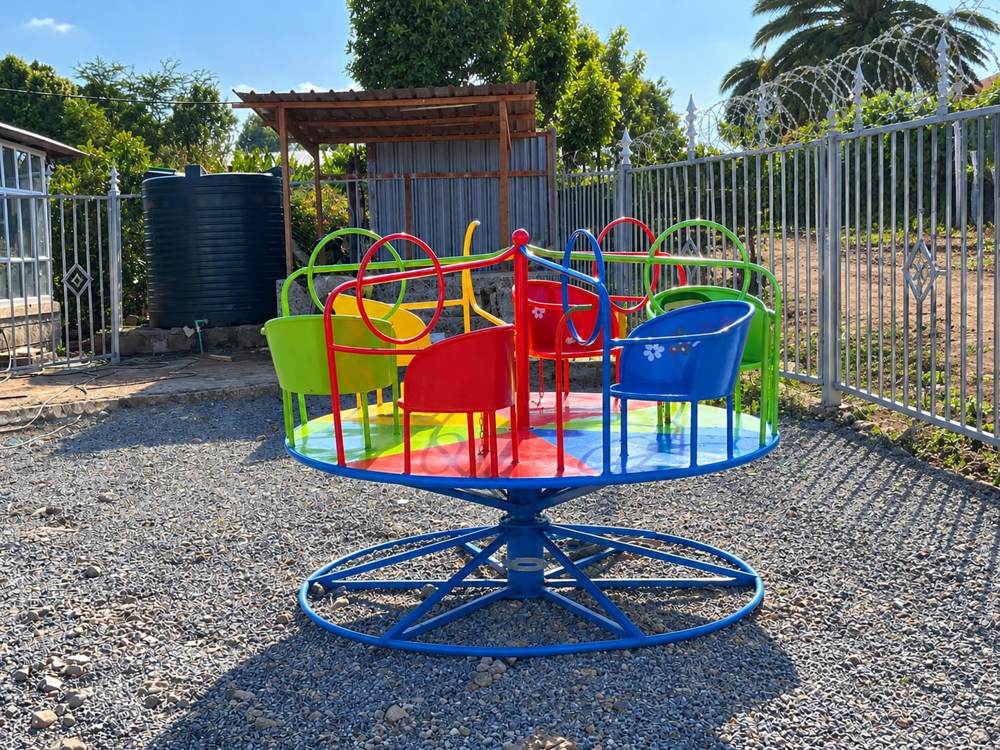 Colourful eight-seat carousel in the Kids Zone